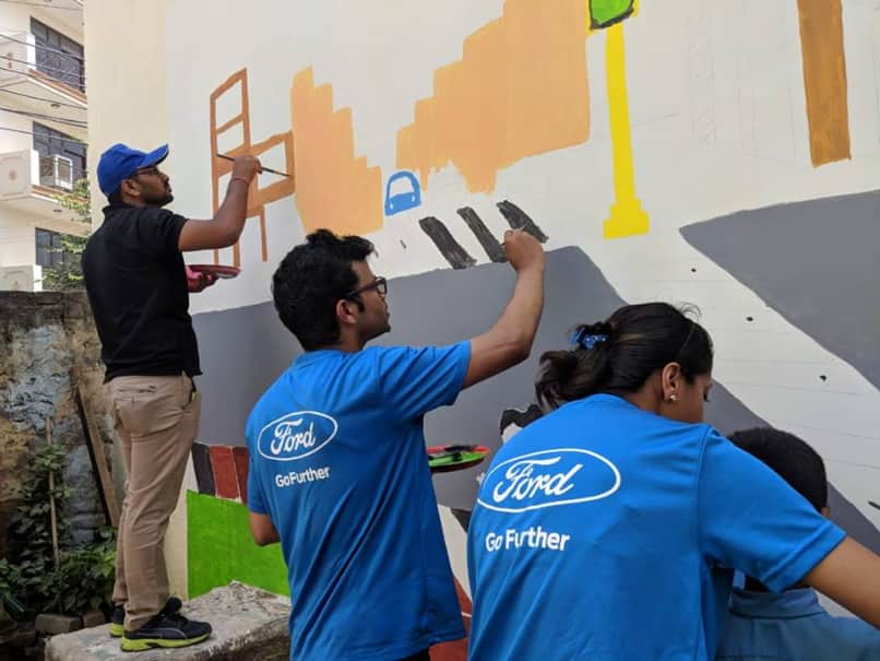 Volunteers at the Mural Painting Activity Volunteers at the Mural Painting Activity